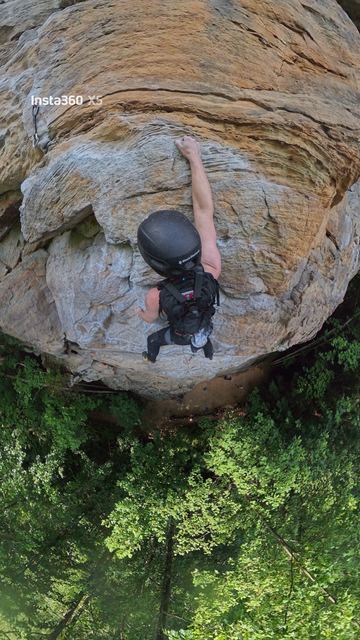 Climbing a sandstone overhang, seen from above